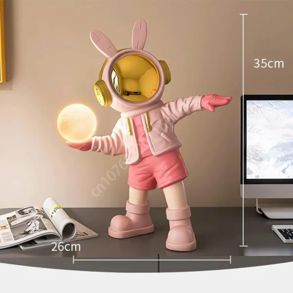 Figura astronauta con luna luminosa - Imagen 2