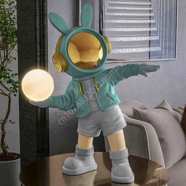 Figura astronauta con luna luminosa - Imagen 3
